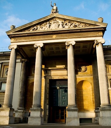 The entry of the world's first university museum ~ Ashmolean Museum on Beaumont Street, Oxford, England (2005 photo by Merlin Cooper)
