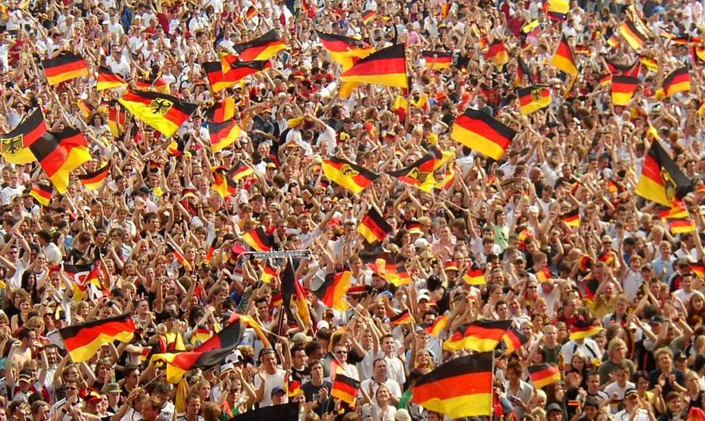 German Unity Day Re-unification Germany celebration Germans celebrating flags crowd Worldcup soccer photo by Arne Müseler